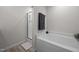 Clean bathroom featuring a combination tub and shower with a modern design and updated fixtures at 4097 Cordiality Church Rd, Nashville, NC 27856