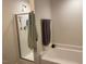 Bright bathroom with a tub and shower, plus sleek fixtures and a towel rack at 4097 Cordiality Church Rd, Nashville, NC 27856
