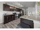 Modern kitchen featuring stainless appliances, granite countertops, and ample cabinet space at 4097 Cordiality Church Rd, Nashville, NC 27856