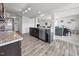 Modern kitchen with stainless steel appliances, a kitchen island and an open concept design at 4097 Cordiality Church Rd, Nashville, NC 27856