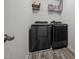 Laundry room features modern washer and dryer set for convenient chores at 4097 Cordiality Church Rd, Nashville, NC 27856
