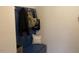 A convenient mudroom area with a blue storage bench and hooks for organizing coats and bags at 4097 Cordiality Church Rd, Nashville, NC 27856