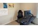 A cozy office space featuring gaming setup, including a comfortable chair and a sleek monitor at 4097 Cordiality Church Rd, Nashville, NC 27856