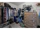 Spacious walk-in closet with ample storage solutions, including shelving and a built-in dresser at 4097 Cordiality Church Rd, Nashville, NC 27856