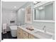 Bathroom boasts a modern soaker tub, double sink vanity, and elegant fixtures, creating a relaxing retreat at 45 Birnham Ln, Durham, NC 27707
