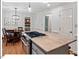 Charming kitchen featuring stainless appliances and a central island with cooktop at 45 Birnham Ln, Durham, NC 27707
