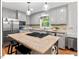 Spacious kitchen with stainless appliances and a large island at 45 Birnham Ln, Durham, NC 27707