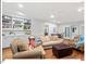 Bright living room with built-in shelving and hardwood floors at 45 Birnham Ln, Durham, NC 27707