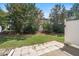 The backyard has a patio, lawn, landscaping, and is partially fenced at 4807 Landover Charge Ln, Raleigh, NC 27616