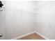 Well-organized walk-in closet with wire shelving at 4807 Landover Charge Ln, Raleigh, NC 27616