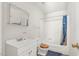 Bright bathroom with a shower-tub combination and a single sink vanity at 501 Magnolia Dr, Rocky Mount, NC 27801