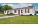 Charming multi-unit home with a well-maintained lawn and inviting red accents at 501 Magnolia Dr, Rocky Mount, NC 27801
