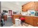 Kitchen and living area with wood paneling and basic appliances at 501 Magnolia Dr, Rocky Mount, NC 27801