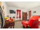 Living room showcasing carpet flooring and furniture, including a dining table at 501 Magnolia Dr, Rocky Mount, NC 27801