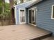 Wooden deck shows the transition to the house with sliding glass doors at 507 Holtz Ln, Cary, NC 27511
