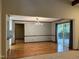 Bright dining room featuring hardwood floors, modern lighting, and sliding glass doors to the deck at 507 Holtz Ln, Cary, NC 27511