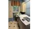 Functional laundry room with side by side washer and dryer, a window, and storage at 507 Holtz Ln, Cary, NC 27511