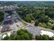 Overhead shot of property at 519 W Raleigh St in Siler City, near shops and tree-lined roads at 519 W Raleigh St, Siler City, NC 27344