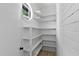 Pantry with custom shelving offering ample storage space at 519 W Raleigh St, Siler City, NC 27344