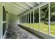 Enclosed back porch with slate flooring at 519 W Raleigh St, Siler City, NC 27344