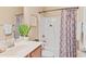 Bathroom with vanity, sink, mirror and shower-tub combo with patterned curtain at 5233 Greymoss Ln, Apex, NC 27539