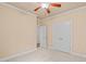 Bedroom featuring neutral colored walls, carpet, and closet access at 5233 Greymoss Ln, Apex, NC 27539
