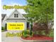 Inviting front yard with charming landscaping and an Open House sign for Sunday, June 8, from 1-3 p.m at 5233 Greymoss Ln, Apex, NC 27539