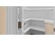 Walk-in pantry featuring white shelving for organized food storage at 5233 Greymoss Ln, Apex, NC 27539