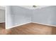 Spacious bedroom features a ceiling fan, wood flooring, and ample natural light at 5805 Craig Rd, Durham, NC 27712