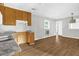 Open concept kitchen with lots of space, a double sink, and resilient flooring at 5805 Craig Rd, Durham, NC 27712