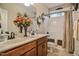 Bathroom features a double sink vanity, a shower/tub combo, and a toilet at 67 Marshlane Way, Clayton, NC 27527
