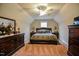 Spacious bedroom featuring a bed, carpet and multiple furnishings at 67 Marshlane Way, Clayton, NC 27527