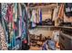 Walk-in closet with multiple storage solutions for clothing and shoes at 67 Marshlane Way, Clayton, NC 27527