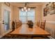 Dining room with table and chairs has a window that lets in natural light at 67 Marshlane Way, Clayton, NC 27527