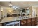Gourmet kitchen featuring an expansive island with stainless steel appliances and granite countertops at 67 Marshlane Way, Clayton, NC 27527