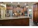 Well-equipped kitchen boasts stainless steel appliances, granite counters, and extensive cabinetry at 67 Marshlane Way, Clayton, NC 27527