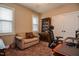 Office features a comfortable chair, cabinet and a large desk at 67 Marshlane Way, Clayton, NC 27527