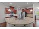 Spacious kitchen with granite countertops, stainless steel appliances, and a sink at 740 Treviso Ln, Apex, NC 27502