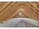 Large attic space showcasing wood framing, ample room for storage or expansion at 7800 Twin Pines Way, Fuquay Varina, NC 27526