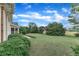 Expansive backyard with lush landscaping, providing a serene and private outdoor space at 7800 Twin Pines Way, Fuquay Varina, NC 27526