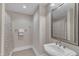 Bathroom featuring a shower with patterned curtain and a modern sink at 7800 Twin Pines Way, Fuquay Varina, NC 27526