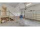 Spacious garage with high ceilings, providing ample storage and parking space at 7800 Twin Pines Way, Fuquay Varina, NC 27526