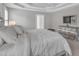 A calming main bedroom with a plush bed and dresser at 7800 Twin Pines Way, Fuquay Varina, NC 27526