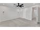 Spacious bedroom with neutral walls, carpet, a ceiling fan, and plenty of natural light at 816 Lilyquist Way, Wake Forest, NC 27587