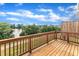 Scenic lake view from the wood deck, offering a serene outdoor experience at 816 Lilyquist Way, Wake Forest, NC 27587
