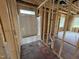 Unfinished bathroom shows framed construction, exposed beams, new shower tub, and some plumbing at 82 Laramie Ln, Selma, NC 27576