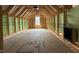 Unfinished bonus room shows framed construction, vaulted ceilings, and exposed beams at 82 Laramie Ln, Selma, NC 27576