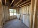 A framed room with insulation showcases the blank canvas for creating your dream living space at 82 Laramie Ln, Selma, NC 27576