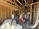 Interior framing showcases the home's layout, insulation, and readiness for customization at 82 Laramie Ln, Selma, NC 27576