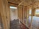 Unfinished living room featuring bare studs, ready to be customized with your personal touches at 82 Laramie Ln, Selma, NC 27576
